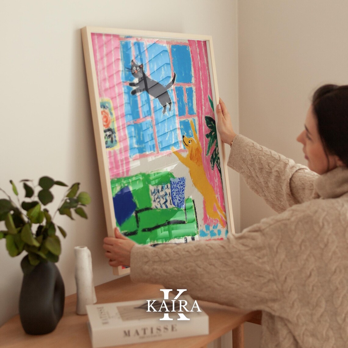 Black Cat and Golden Dog Playing Together in a Living Room Poster - Image 2