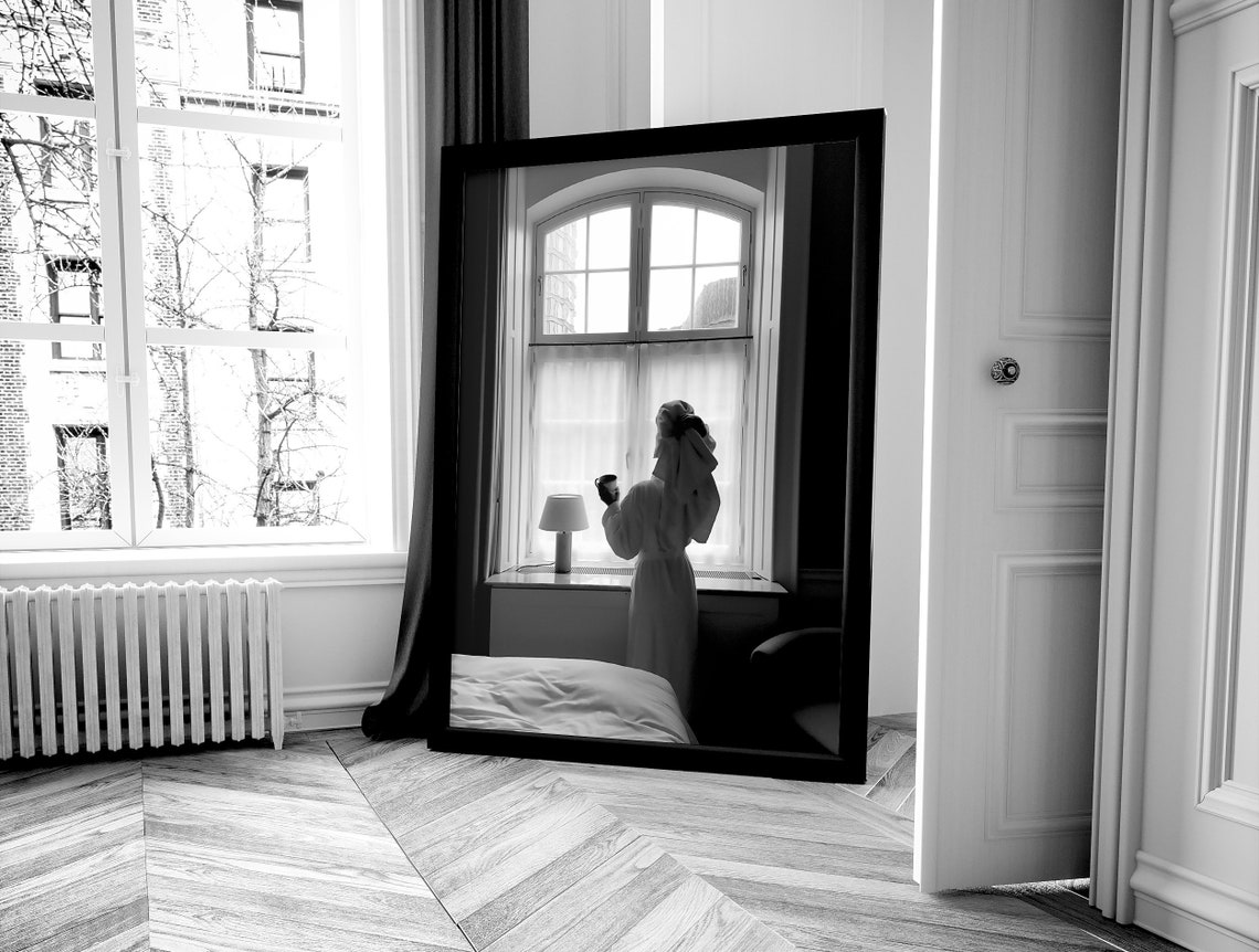 Woman in Robe Drinking Coffee by Window Black and White Photo Poster - Image 4