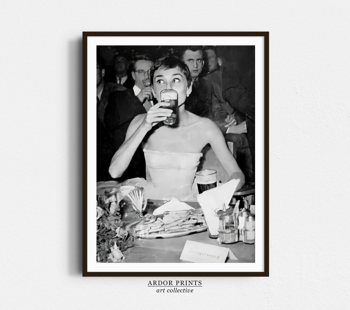 Audrey Hepburn Sipping Beer at Party Black and White Photo Poster