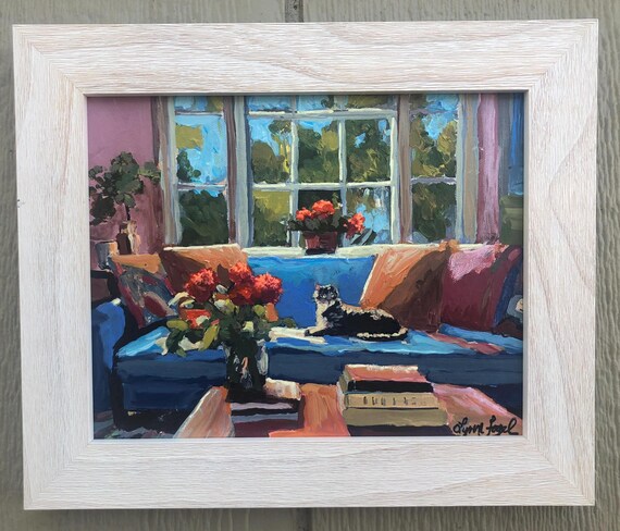 Cozy Tabby Cat Napping on Blue Sofa in Sunlit Living Room Art Poster