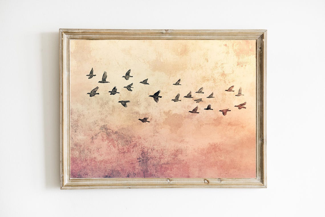 Flock of Birds in Flight at Dawn Over Textured Blush Sky Print