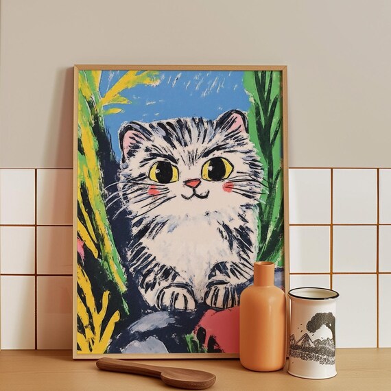 Wide Eyed Fluffy Tabby Kitten Peeking Out of Bright Greenery Poster