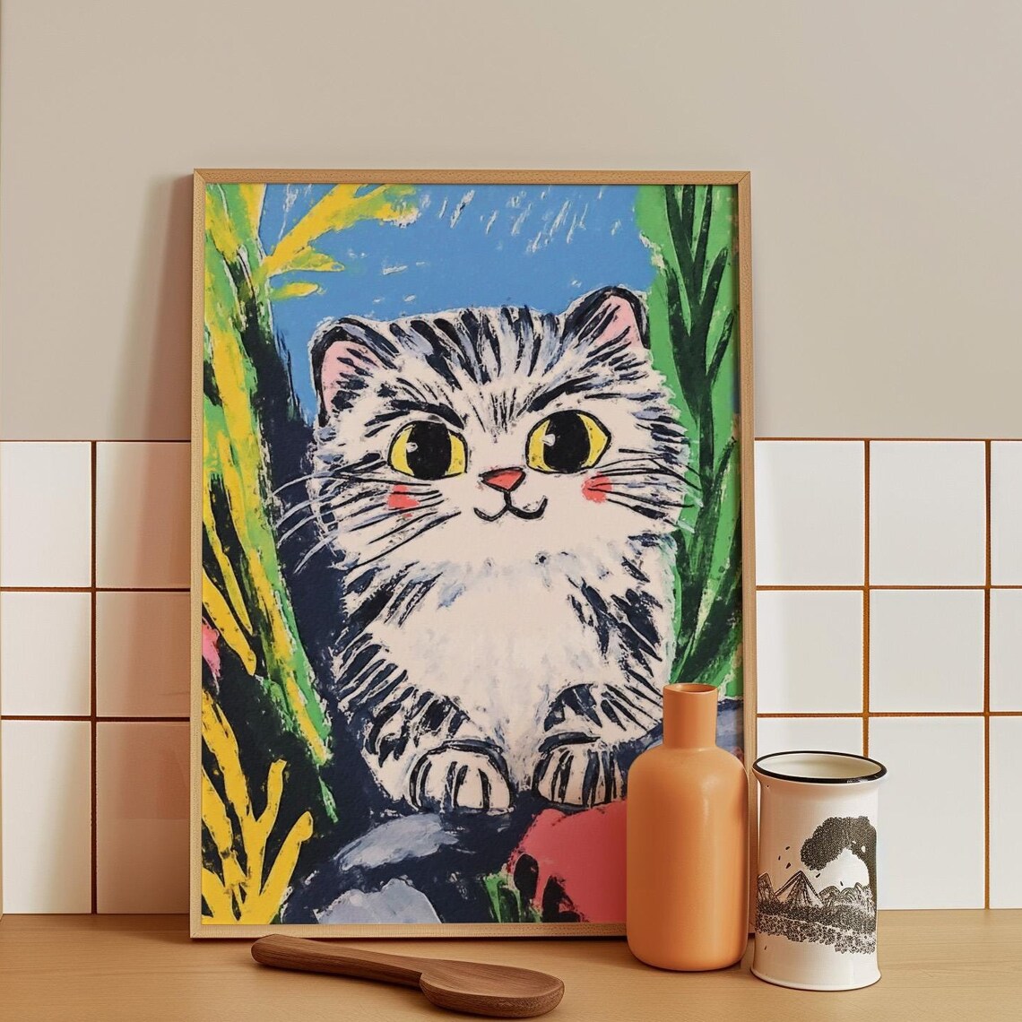 Wide Eyed Fluffy Tabby Kitten Peeking Out of Bright Greenery Poster