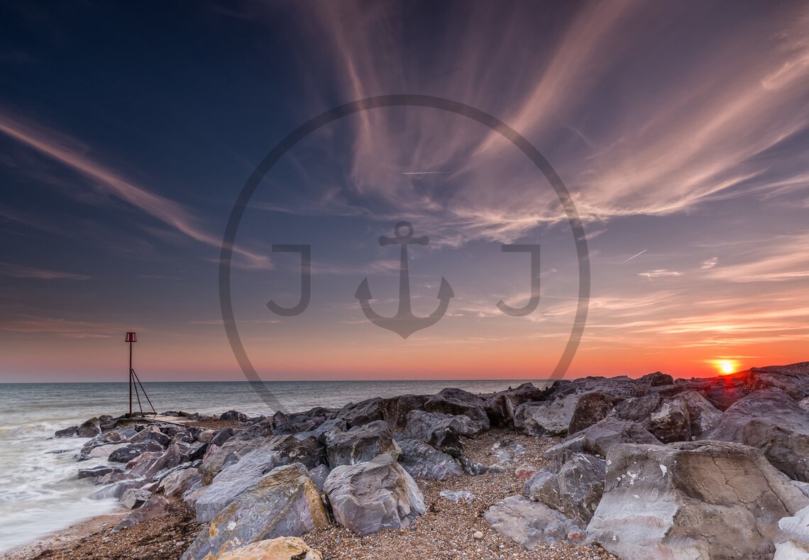 Goring by Sea Sunset with Rocky Beach and Glowing Orange Sun Poster - Image 3