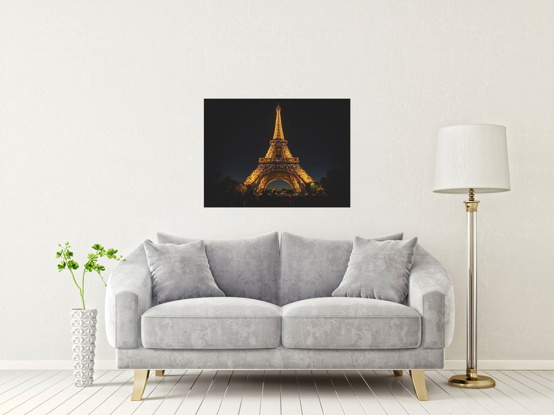 Eiffel Tower Illuminated in Gold Lights at Night in Paris Poster - Image 2