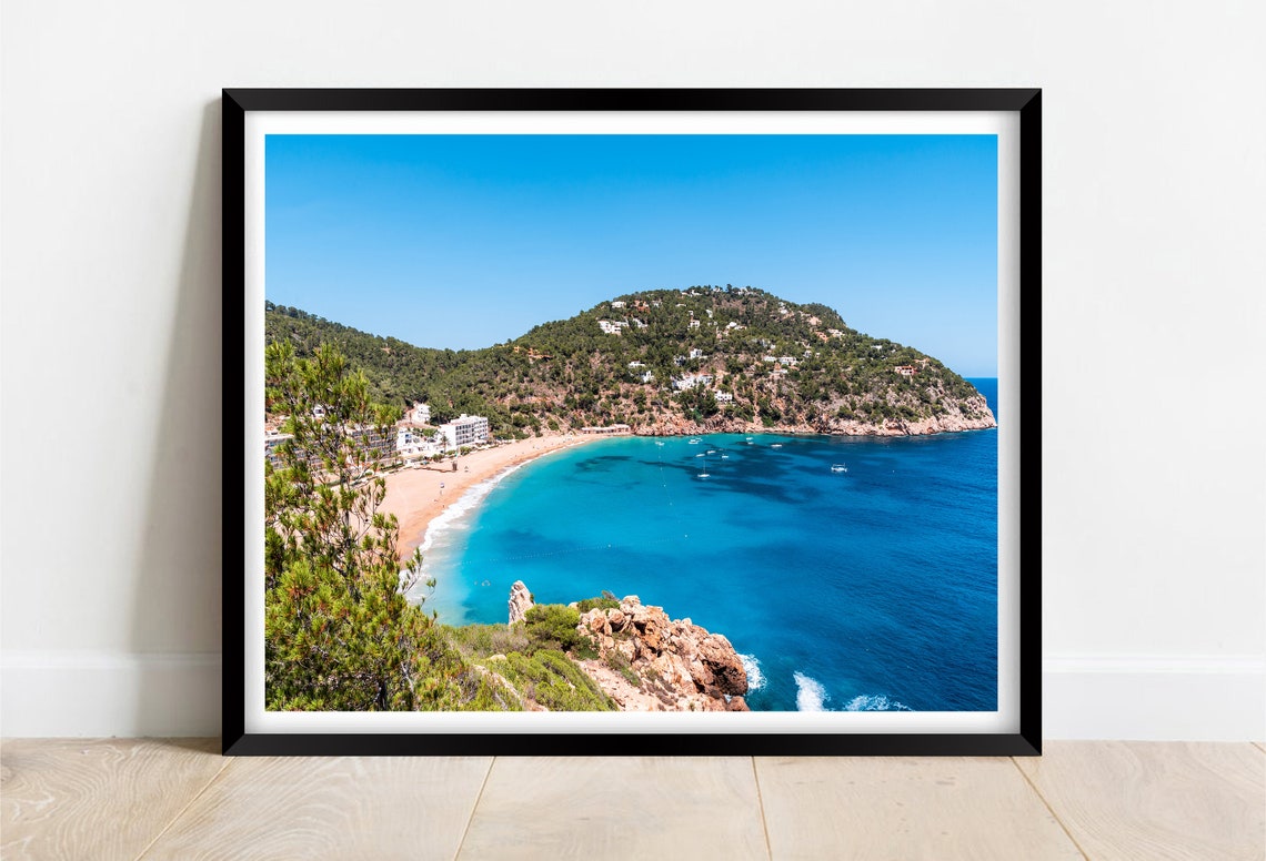 Cala Sant Vicent Ibiza Beach Cove with Green Hills and Pines Poster