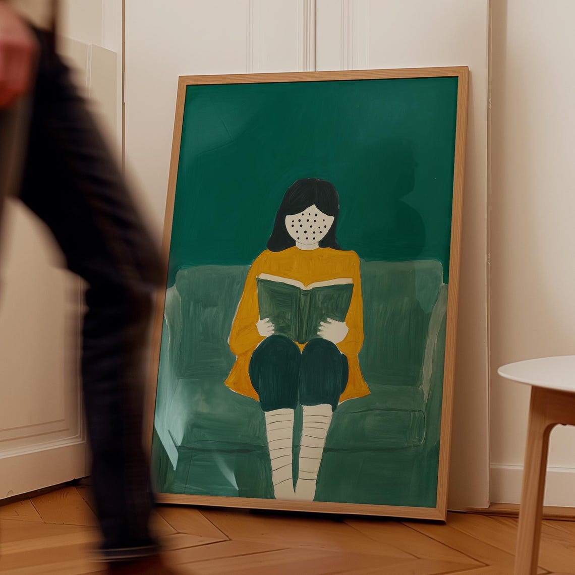 Faceless Reader in a Mustard Sweater Holding a Book on Green Poster - Image 2
