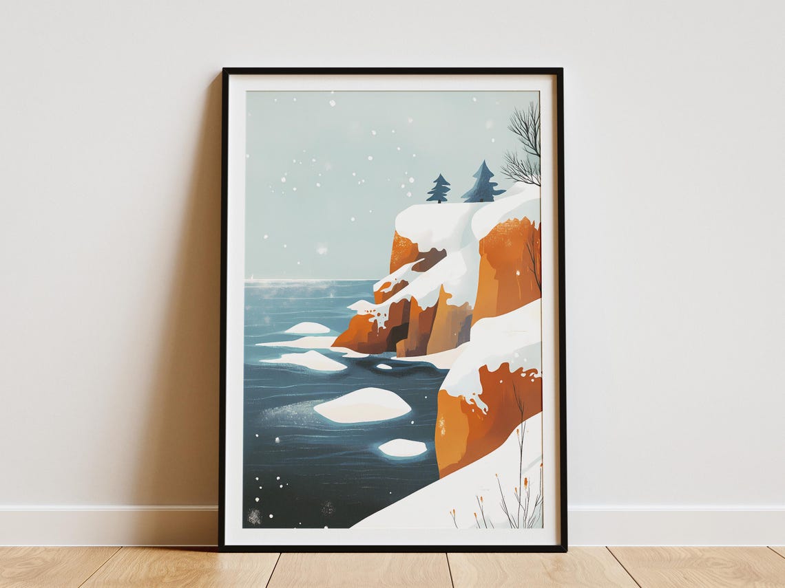 Snowy Orange Cliffs Along a Deep Blue Sea in Falling Snow Poster