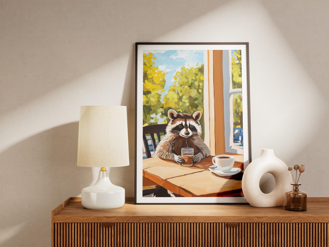 Raccoon Enjoying Coffee At A Wooden Cafe Table By Window Poster - Image 4