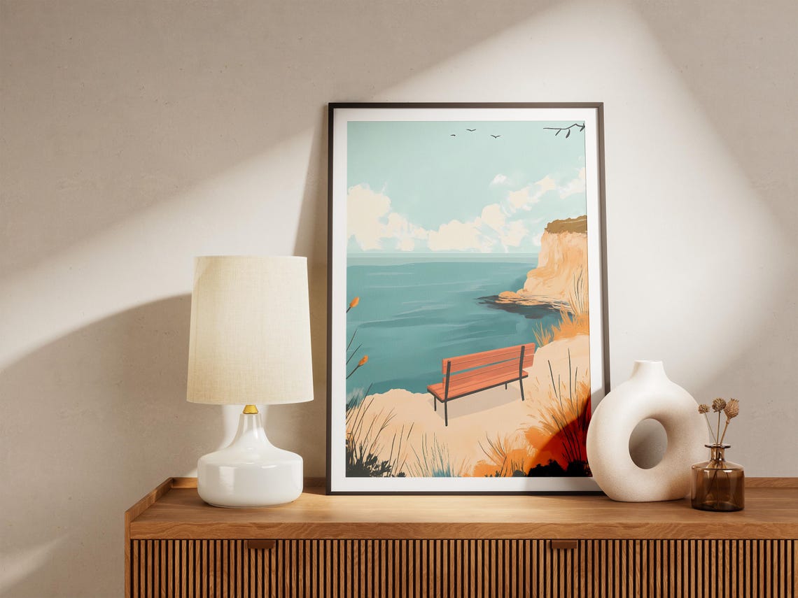 Wooden Bench Overlooking a Calm Teal Sea From a Sandy Cliff Poster - Image 5