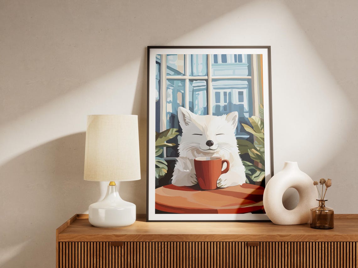 Content White Arctic Fox Holding a Red Mug by a Cafe Window Poster - Image 4