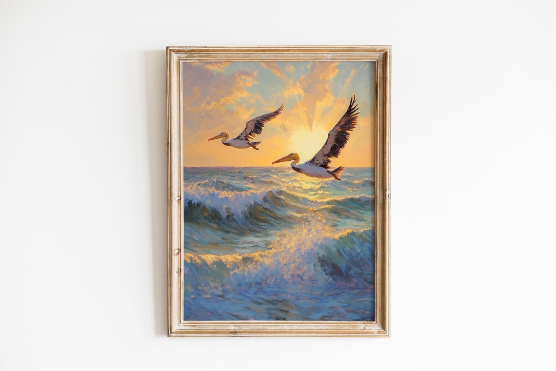 Two Pelicans Gliding Over Sparkling Ocean Waves at Sunset Wall Art