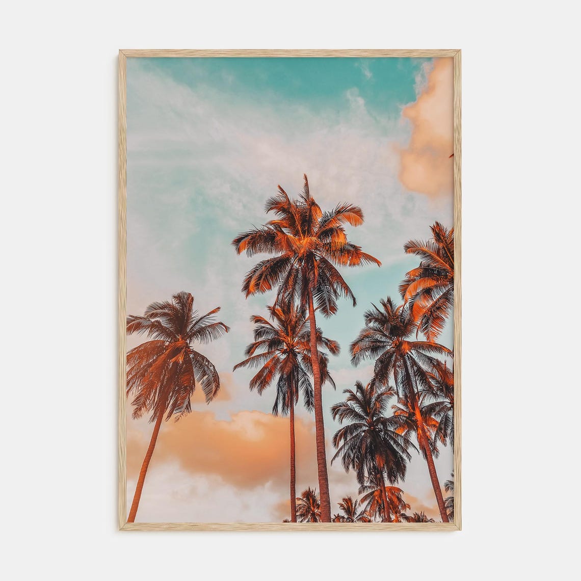 Golden Palm Trees Glowing at Sunset Against a Teal Sky Poster