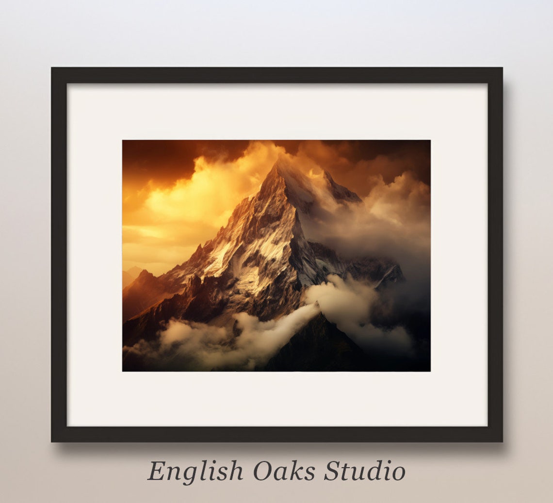 Snow Capped Mountain Peak in Fiery Orange Sunset Glow Poster