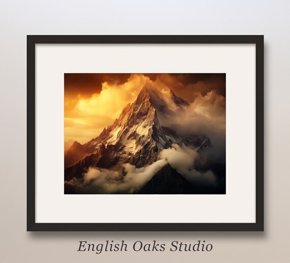 Snow Capped Mountain Peak in Fiery Orange Sunset Glow Poster