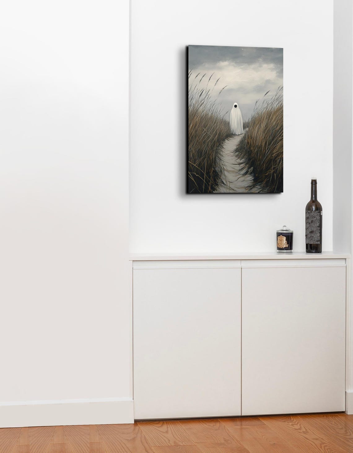 Lone Ghost Walking a Windswept Beach Dune Path Under Cloudy Sky Poster - Image 3