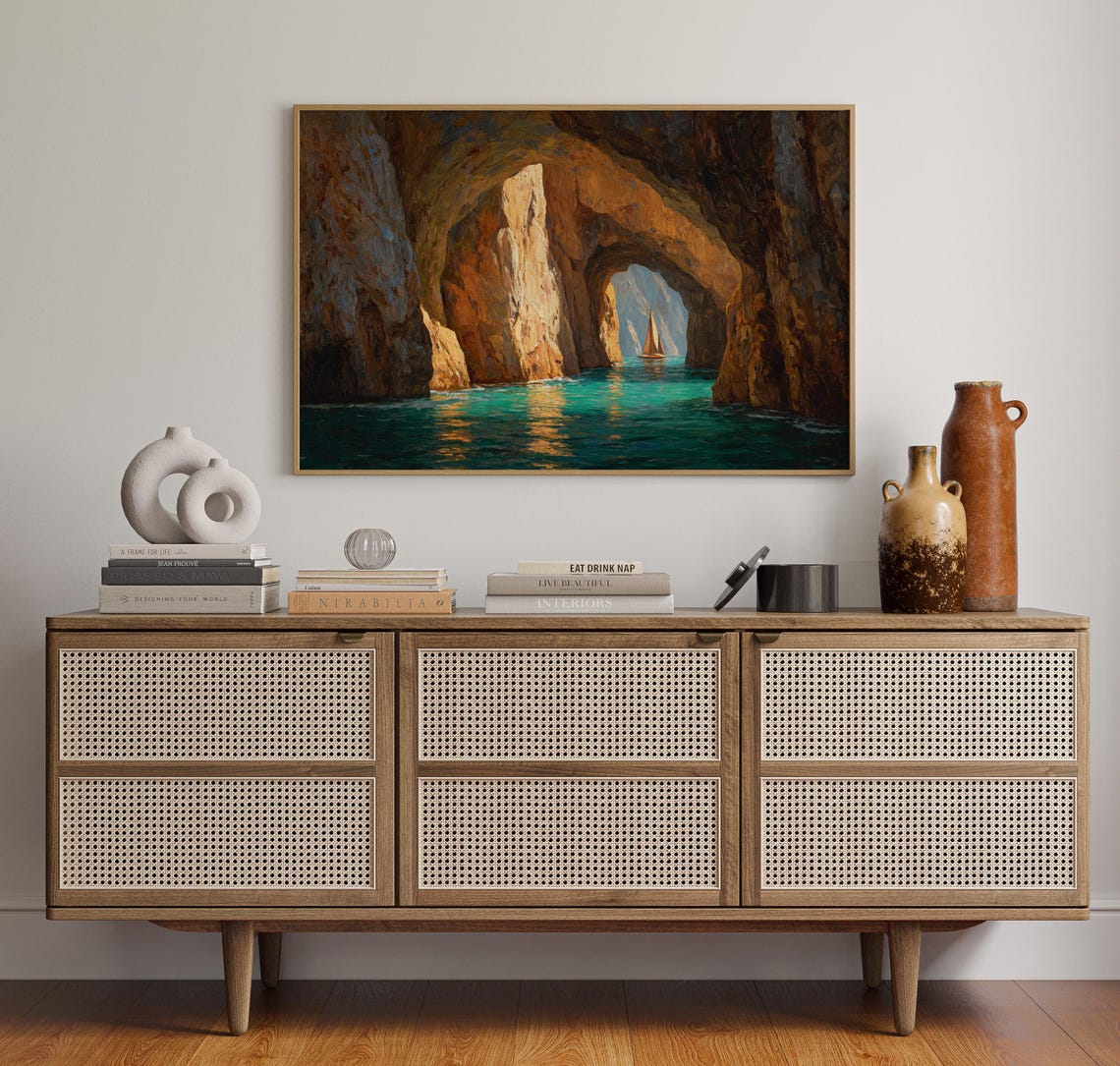 Sailboat Passing Through Golden Sea Cave Rock Arches Art Print