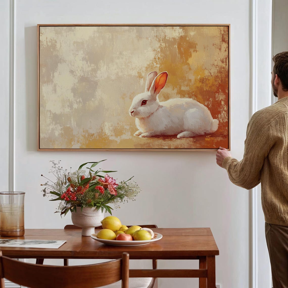 White Rabbit Resting on Warm Golden Textured Background Poster - Image 2