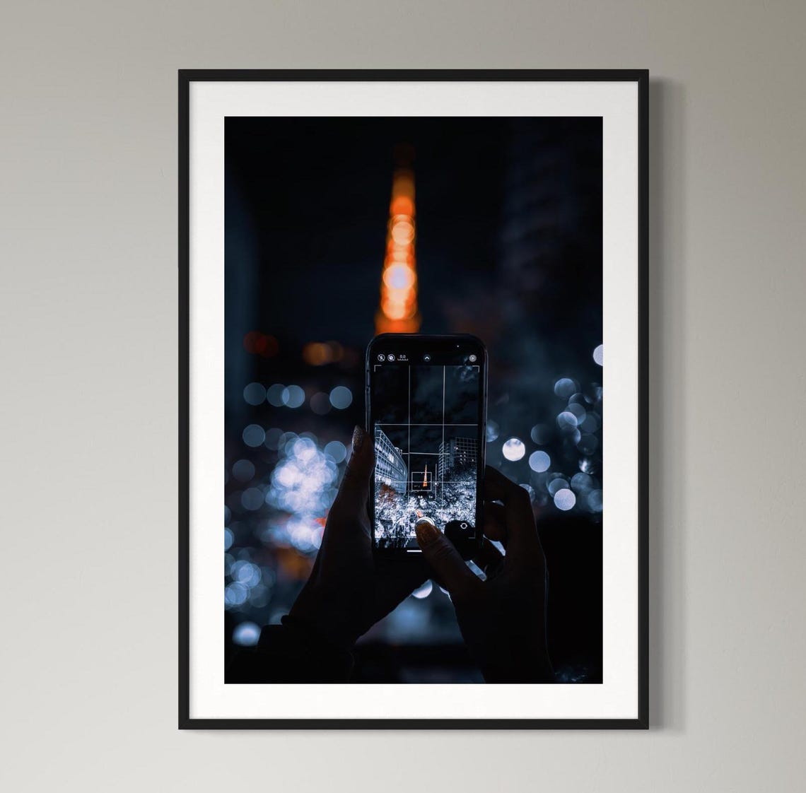 Tokyo Tower Glowing At Night Captured Through Smartphone Screen Poster