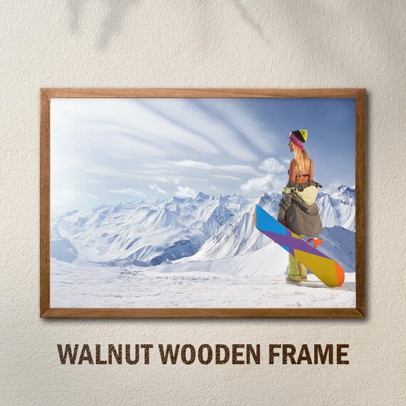 Female Snowboarder Profile Pose Snowy Peak with Colorful Board Poster