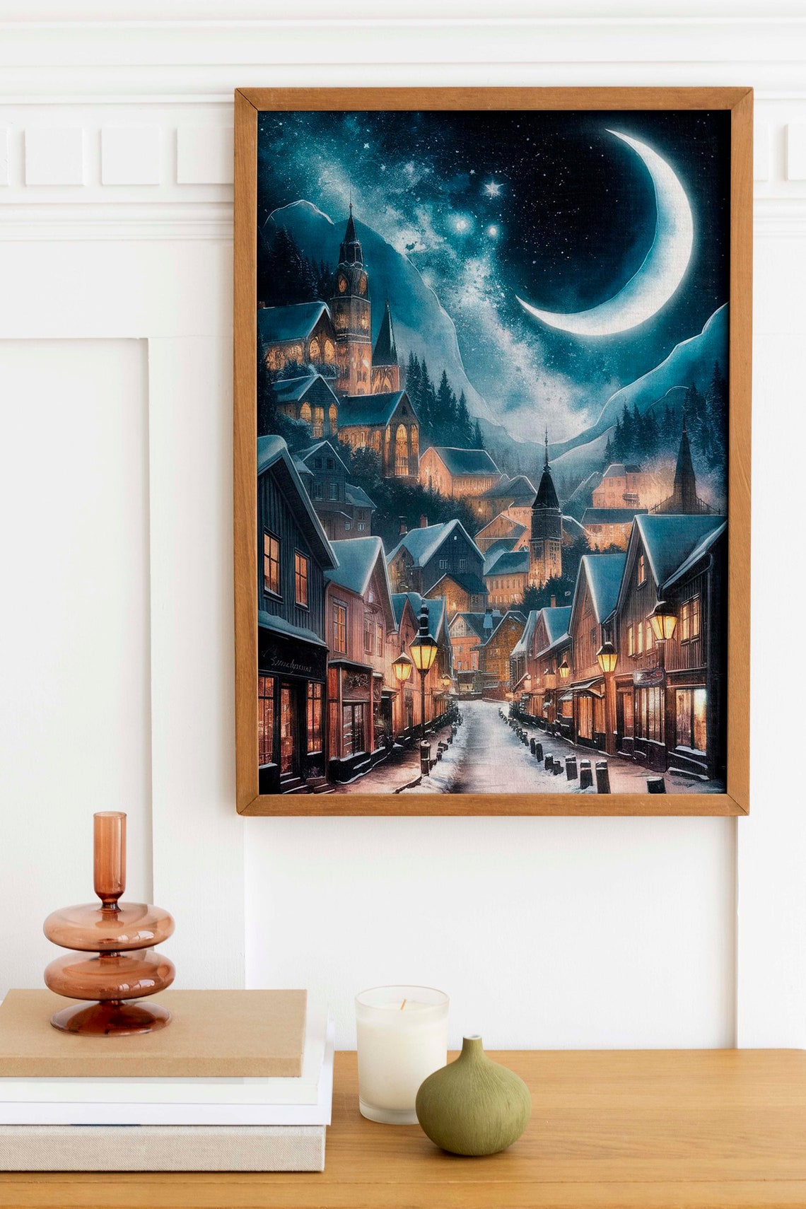 Snowy Winter Village Night Glowing Under a Crescent Moon Poster - Image 2