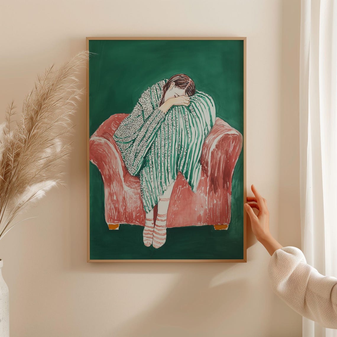 Woman Sleeping Curled in a Pink Armchair with Striped Blanket Poster