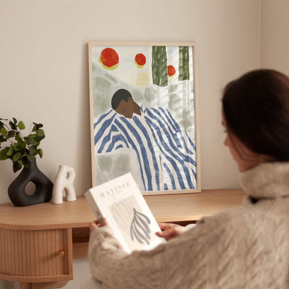 Resting Figure In Blue Striped Robe In A Peaceful Desert Scene Poster