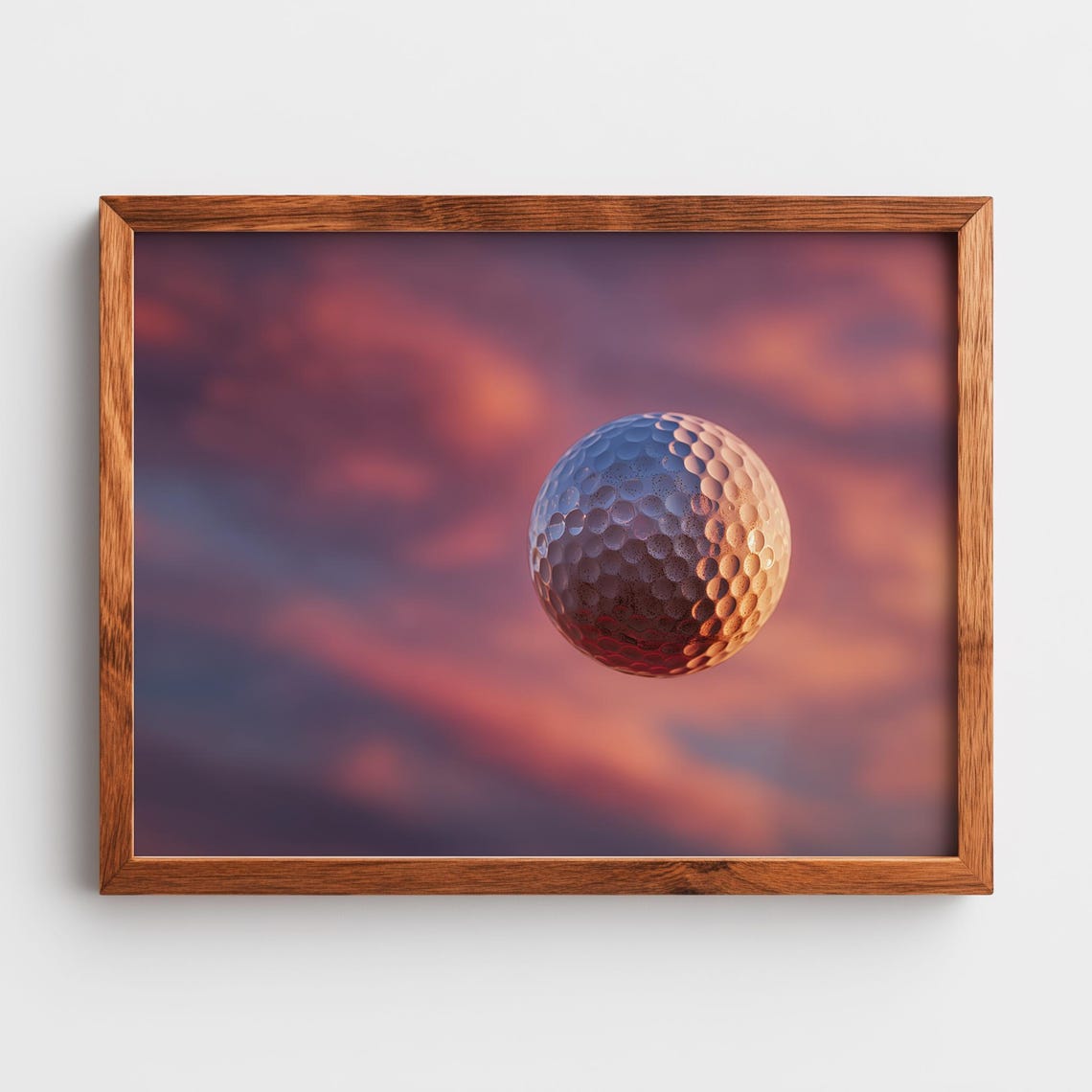 Golf Ball Suspended in Pink Sunset Clouds Dramatic Sports Poster