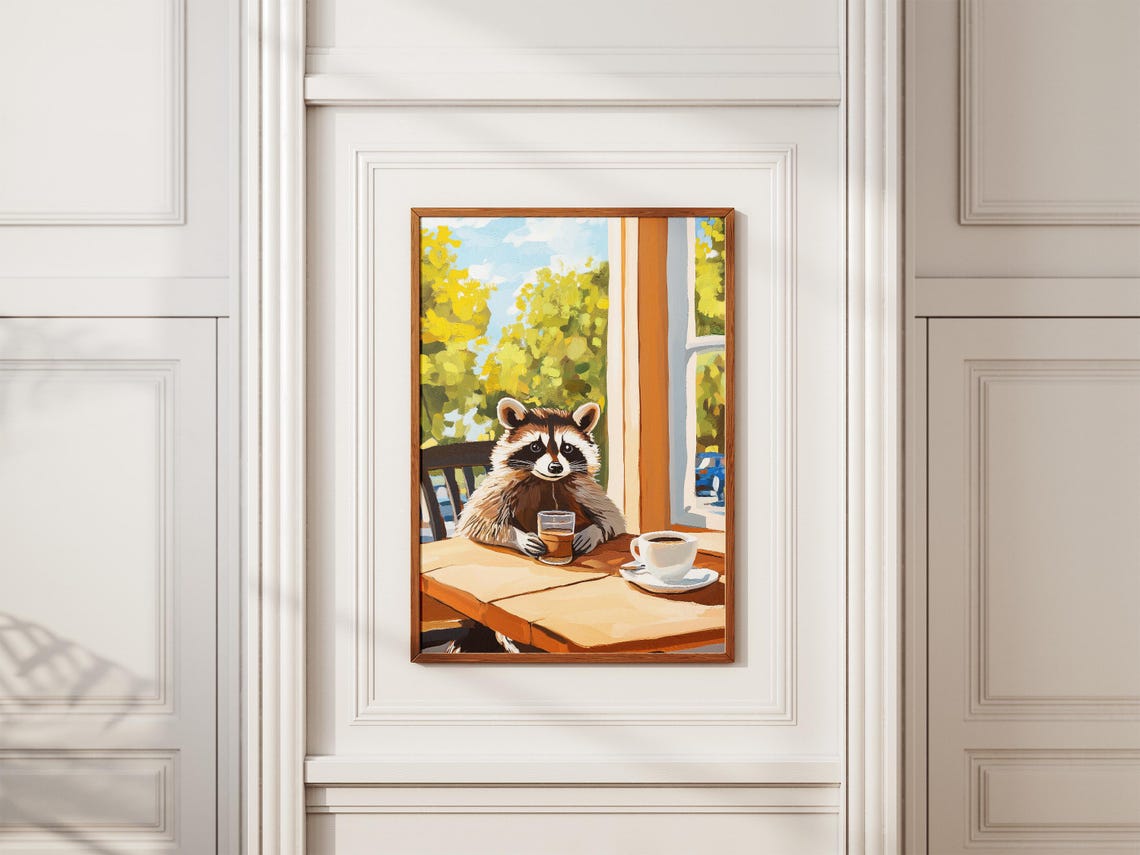 Raccoon Enjoying Coffee At A Wooden Cafe Table By Window Poster - Image 2