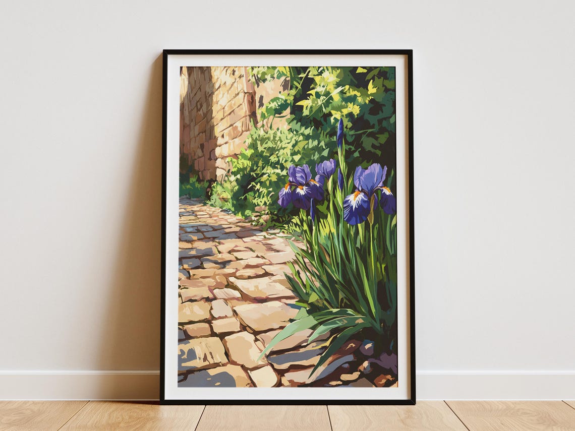 Purple Irises Along a Cobblestone Garden Path Poster With Stone Wall