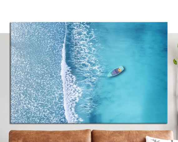 Aerial View Of Lone Boat On Turquoise Sea With Foamy Waves Wall Art