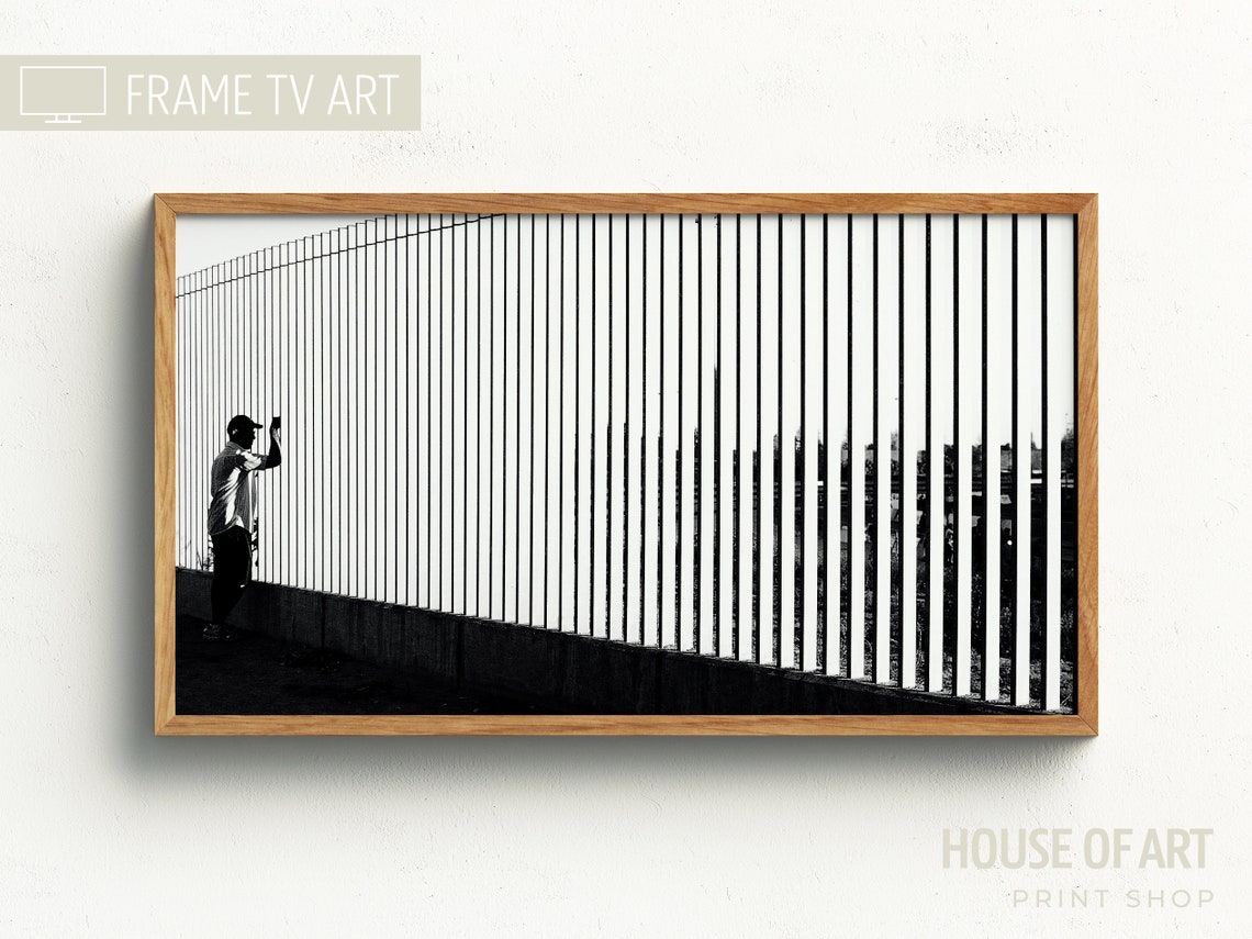 Man By City Fence Black And White Modern Contrast Photography Print - Image 3