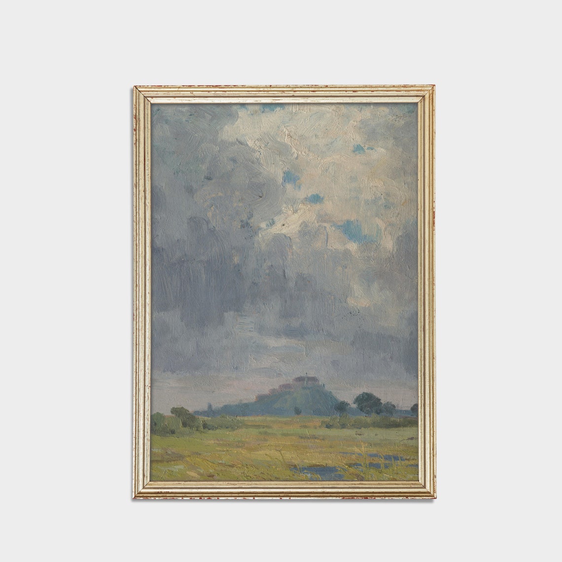 Big Cloudy Sky Over a Green Meadow with a Distant Town Poster - Image 2