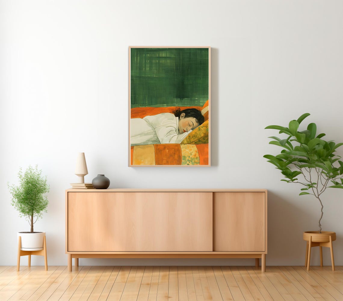Woman Napping on an Orange Couch Against a Green Wall Poster - Image 2