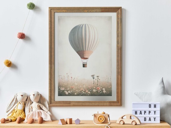 Vintage Hot Air Balloon Poster Drifting Over a Soft Wildflower Meadow