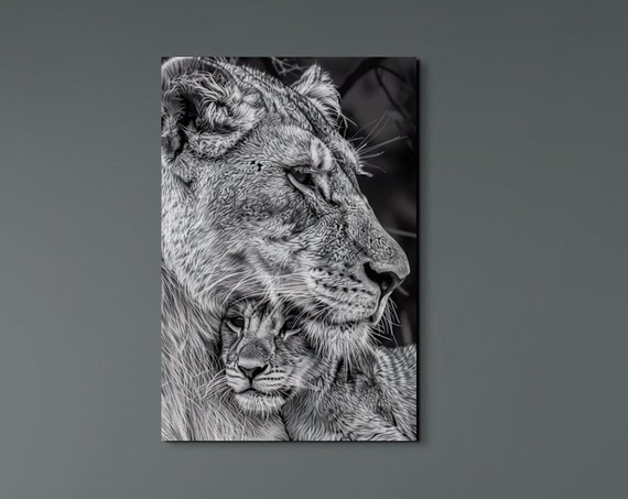Black and White Lioness Holding Her Cub Close Wildlife Poster