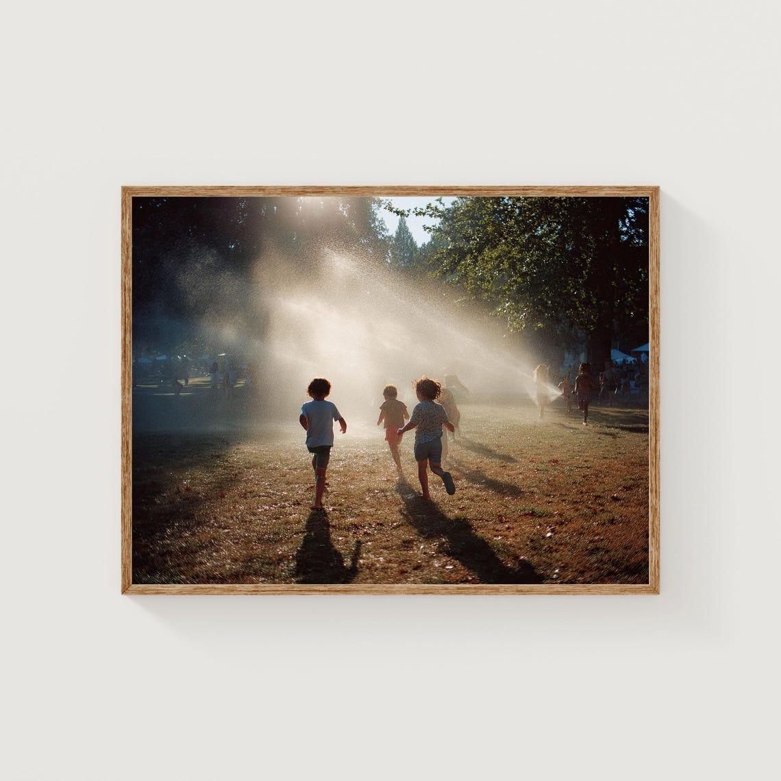 Children Running Through Park Sprinklers Golden Hour Art Print