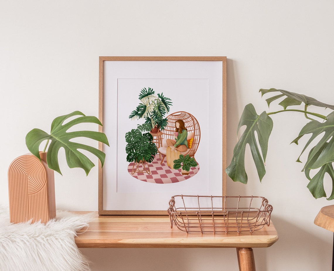 Plant Lady with a Pink Mug in a Rattan Egg Chair Monstera Nook Poster - Image 2