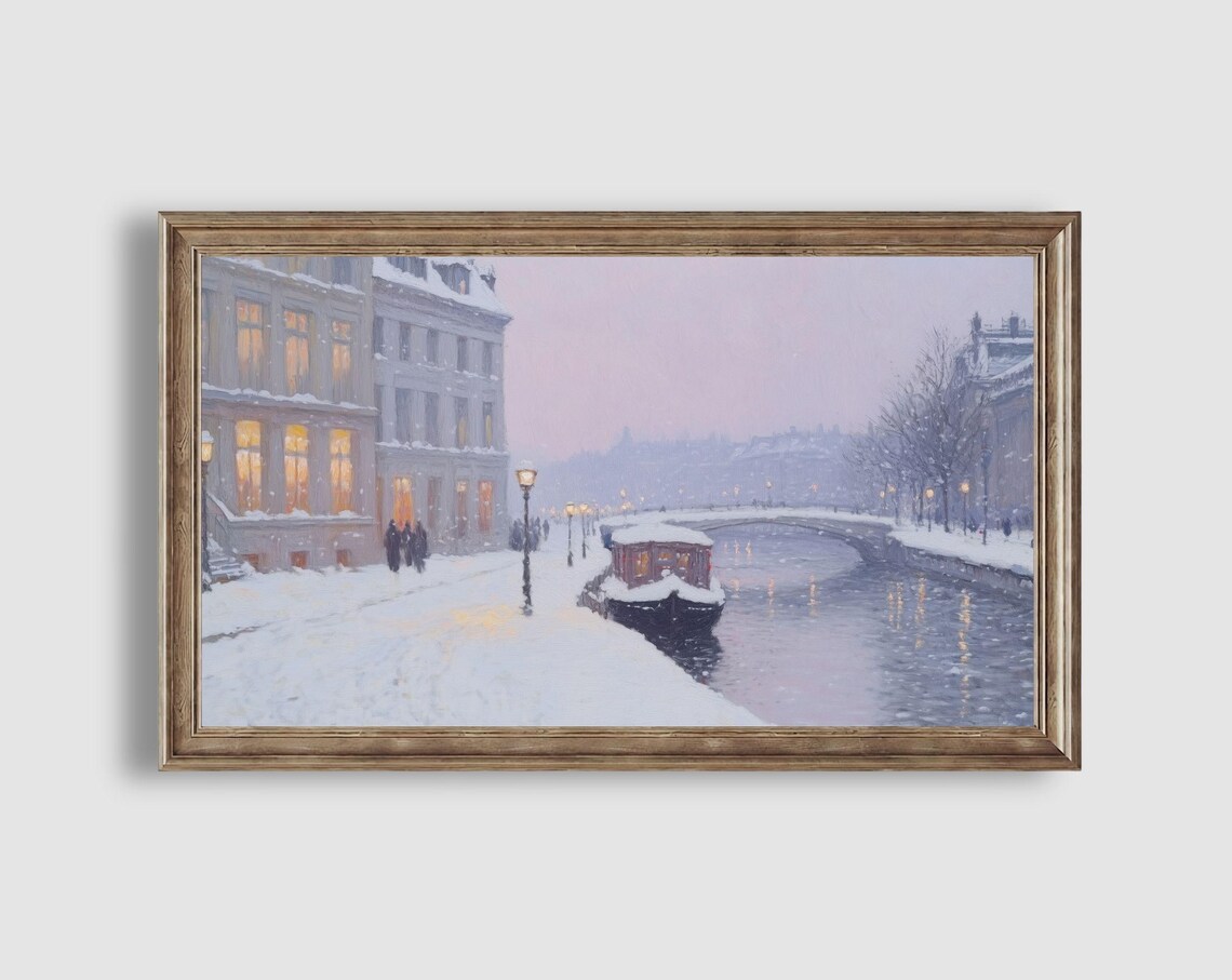 Snowy Canal with Houseboat Glowing Buildings and Bridge Winter Painting Poster - Image 2
