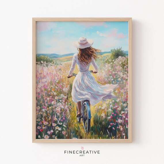Woman in White Dress Cycling Through a Sunny Flower Field Poster