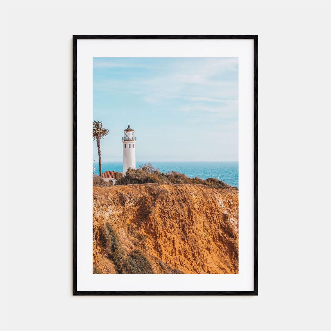 White Lighthouse on Red Cliffs Above the Ocean Coastal Poster