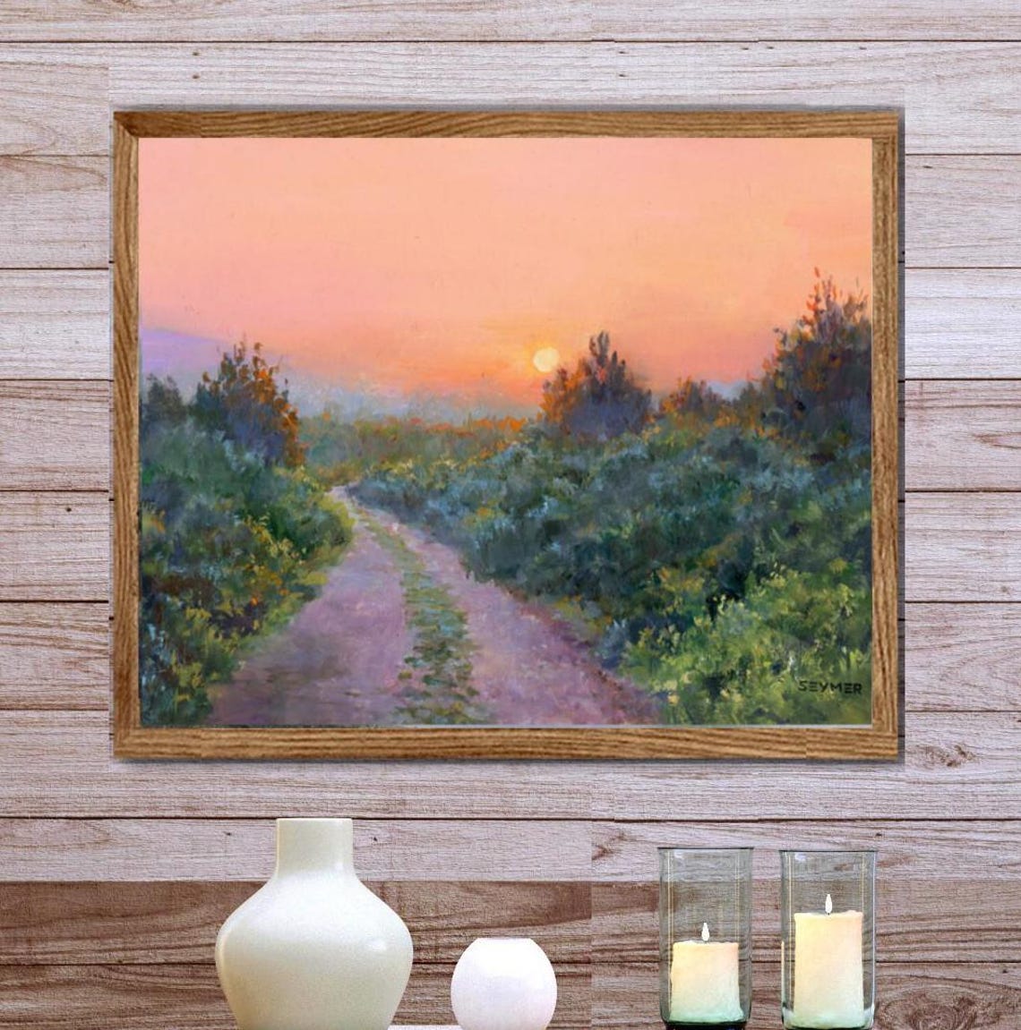 Country Lane Winding toward a Peach-Colored Sunset Sky Poster