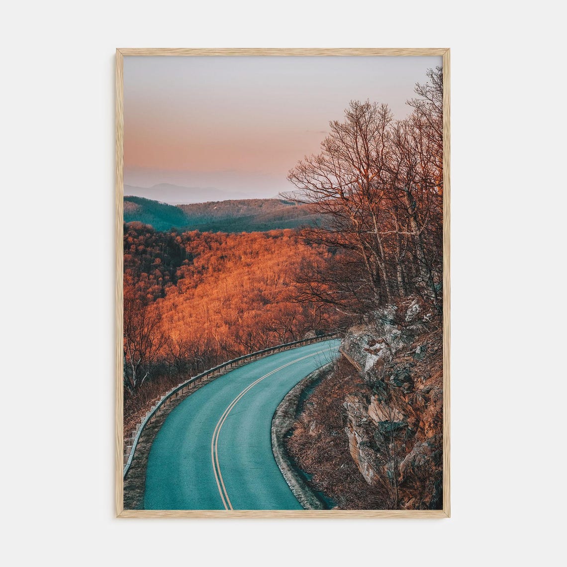 Winding Mountain Road at Sunset Through Fiery Autumn Hills Poster