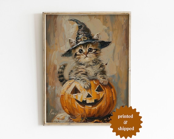Tabby Kitten in Witch Hat Peeking Over a Jack-O-Lantern Poster
