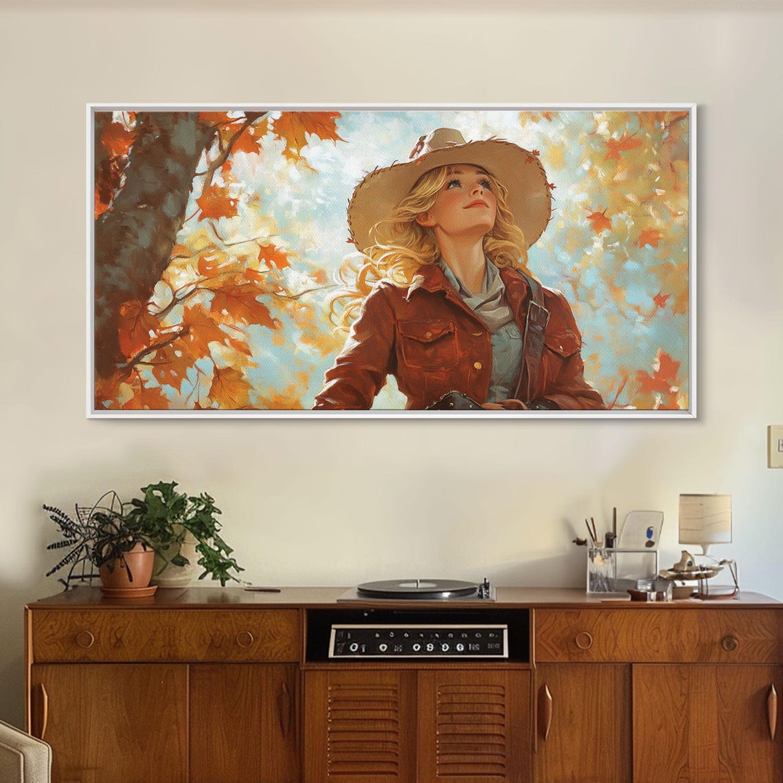 Young Cowgirl In A Straw Hat Among Falling Autumn Leaves Art Print