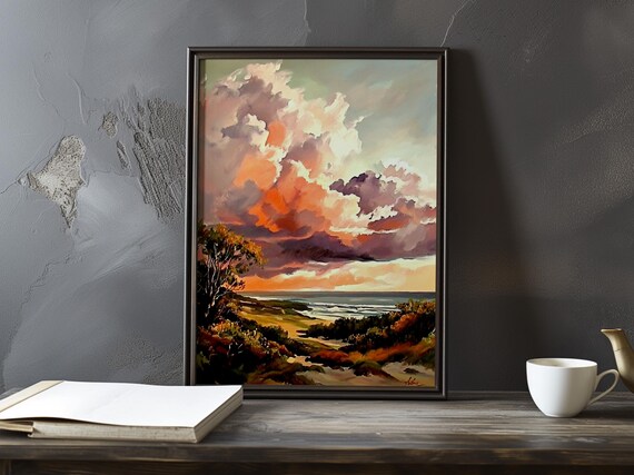 Fiery Orange Clouds Over a Coastal Dune Bay at Sunset Poster
