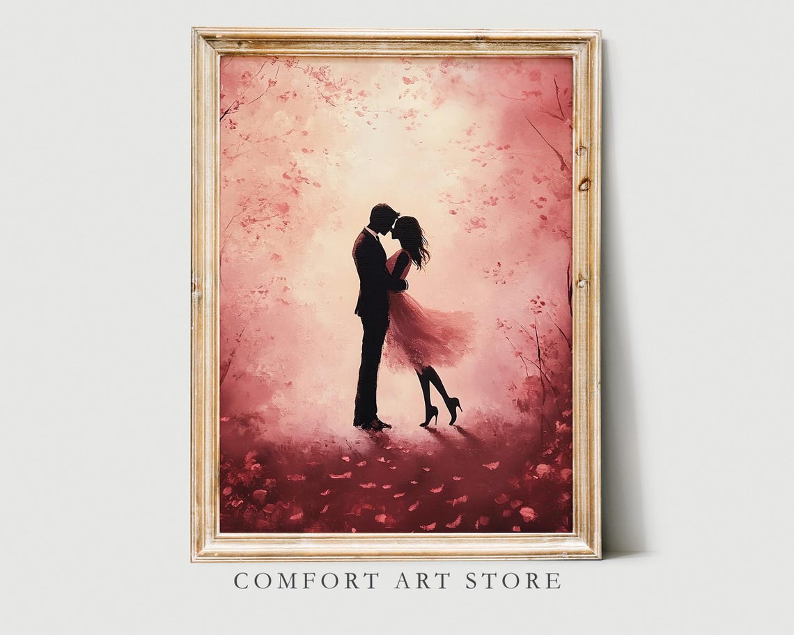 Romantic Couple Silhouette Embracing Under Pink Blossoms Poster