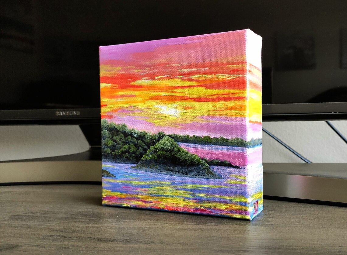 Pink Orange Sunset Sky Over Water With Green Island Rocks Art Poster - Image 2