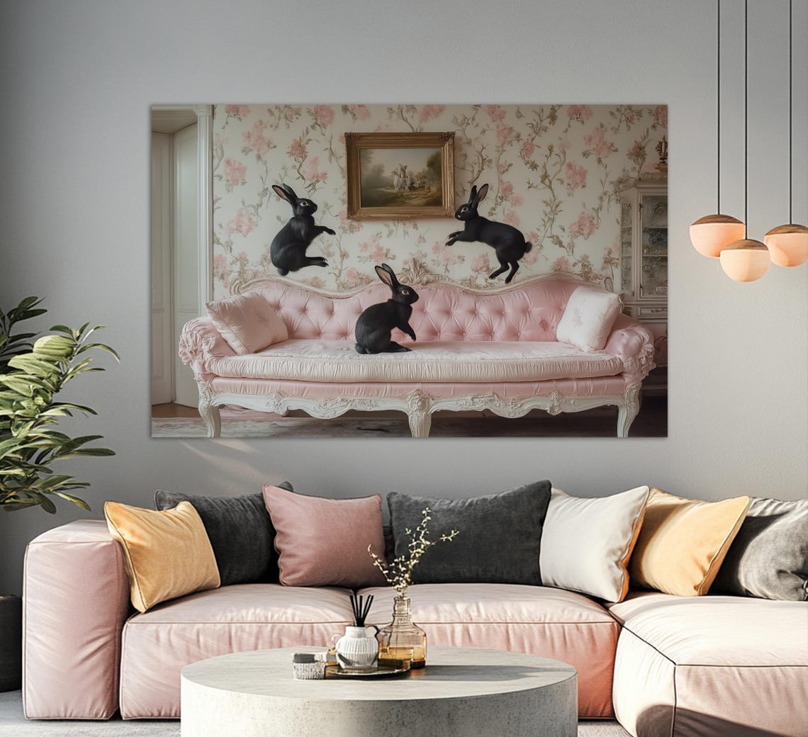 Cute Black Rabbits Jumping On Pink Vintage Sofa Nursery Wall Art