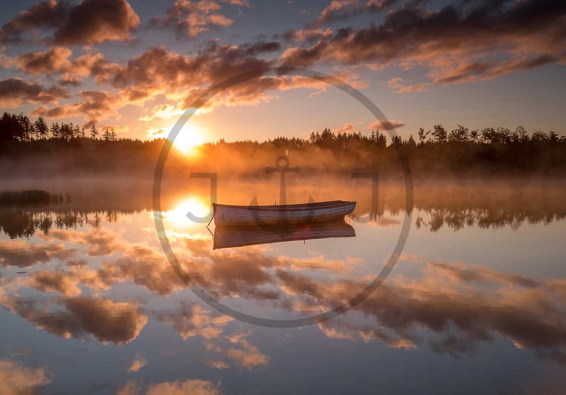 Lone Wooden Rowboat on a Misty Lake at Golden Sunrise Poster - Image 3